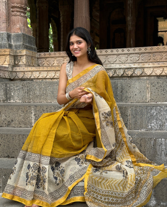 Yellow brown motif Kota doriya saree