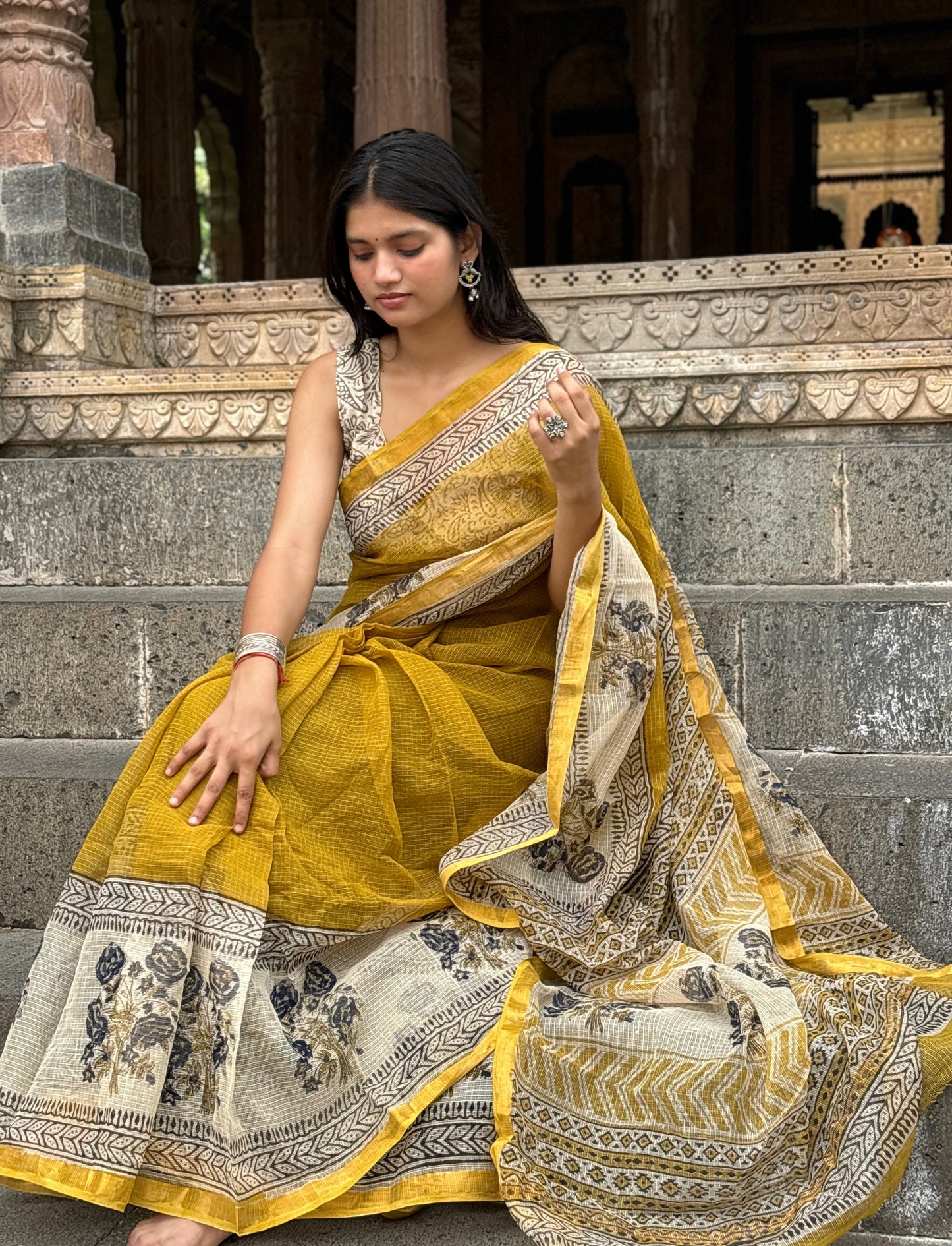 Yellow brown motif Kota doriya saree